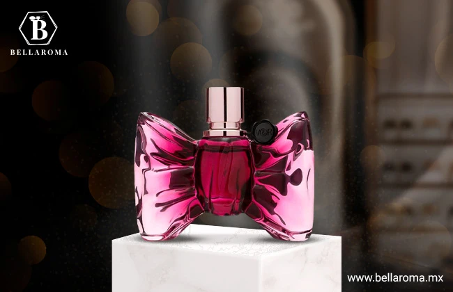 Perfume en forma de bombón de color magenta oscuro