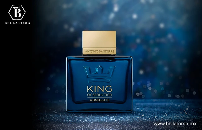 Envase de cristal cuadrado de color azul con tapa dorada de la fragancia King Of Seduction Absolute